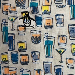 Men’s short sleeved Penguin cocktail print button down shirt. Size Men’s medium.